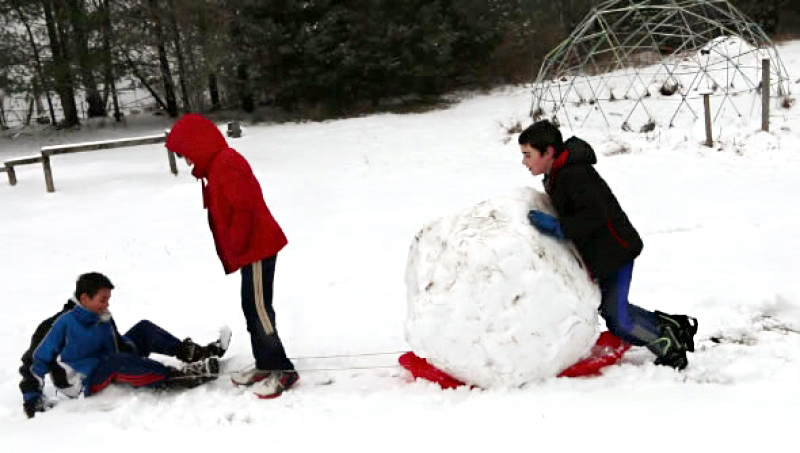 Kids at Little River Community School playing in the snow