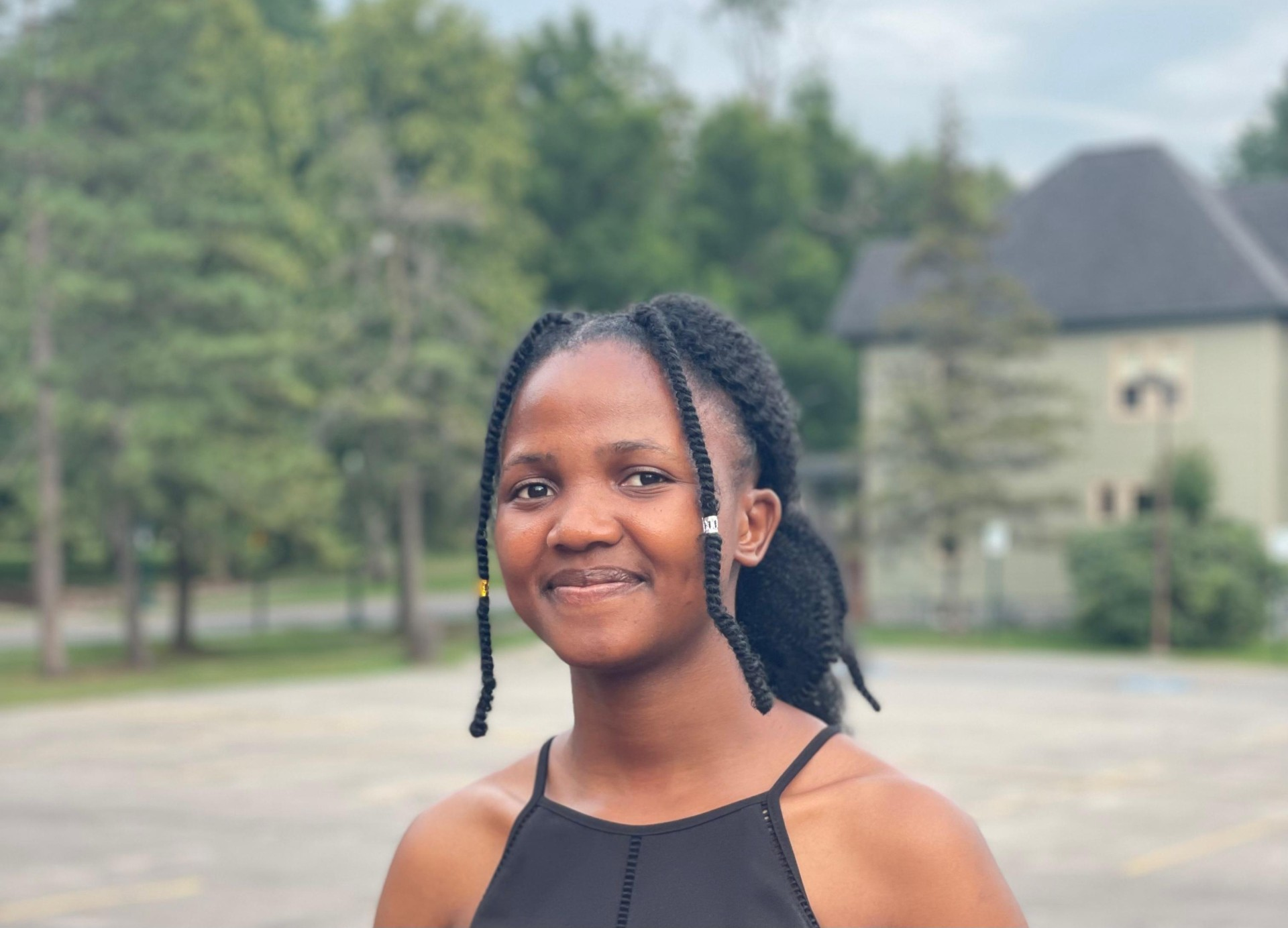 Lala with a SLU campus backdrop