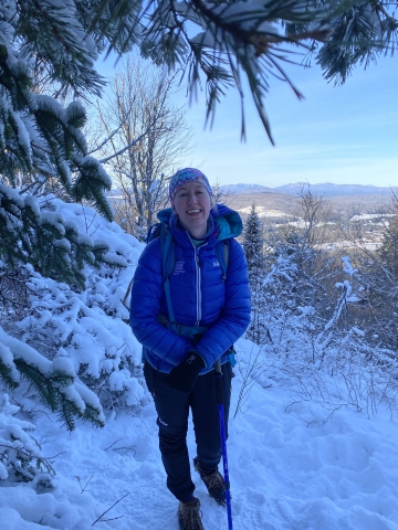 Photo of Kayla at the top of Mt. Baker in snowy conditions